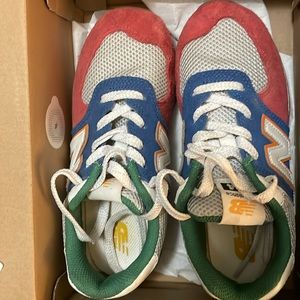 New Balance, multi color. Great Condition, size 1 Youth.